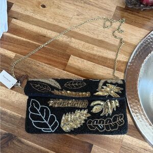 Francesca's Black and Gold Leaf Clutch